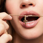 Cross-shaped charm